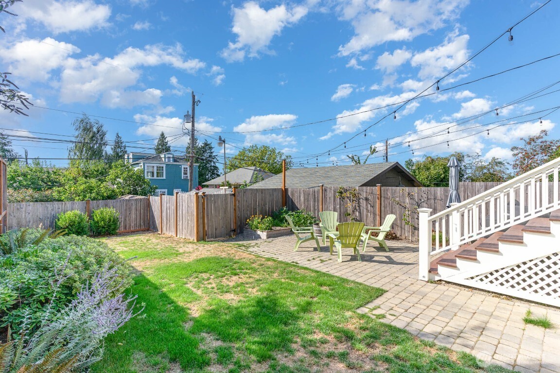 1607 6th Avenue West Seattle, WA 98119 - Photo 26 of 27 a view of a chair and tables in the patio