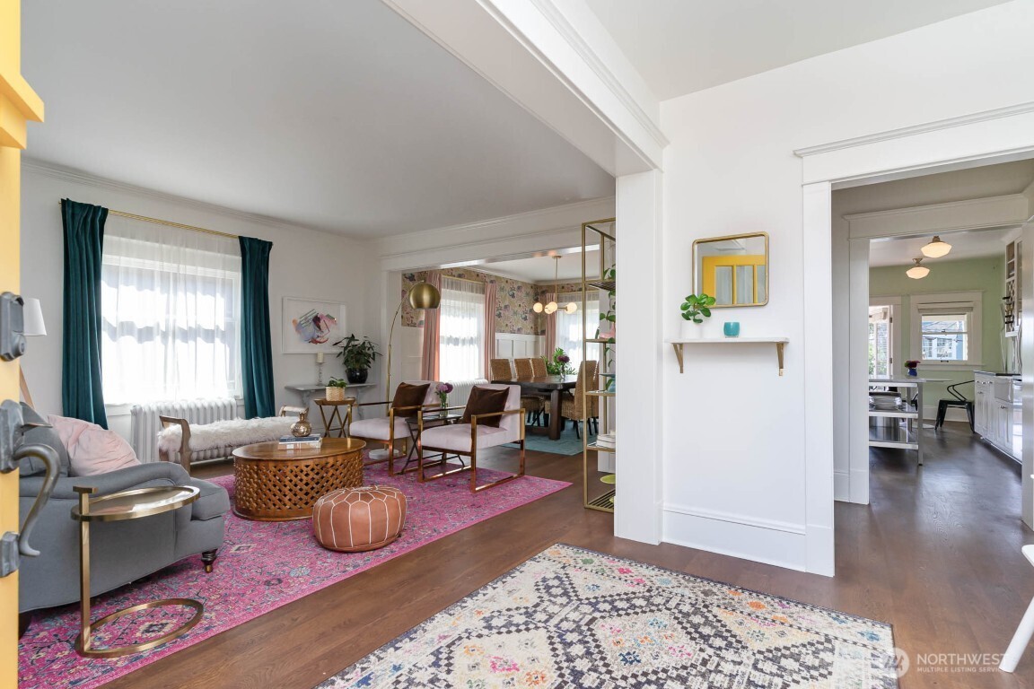 1607 6th Avenue West Seattle, WA 98119 - Photo 5 of 27 a living room with furniture and wooden floor