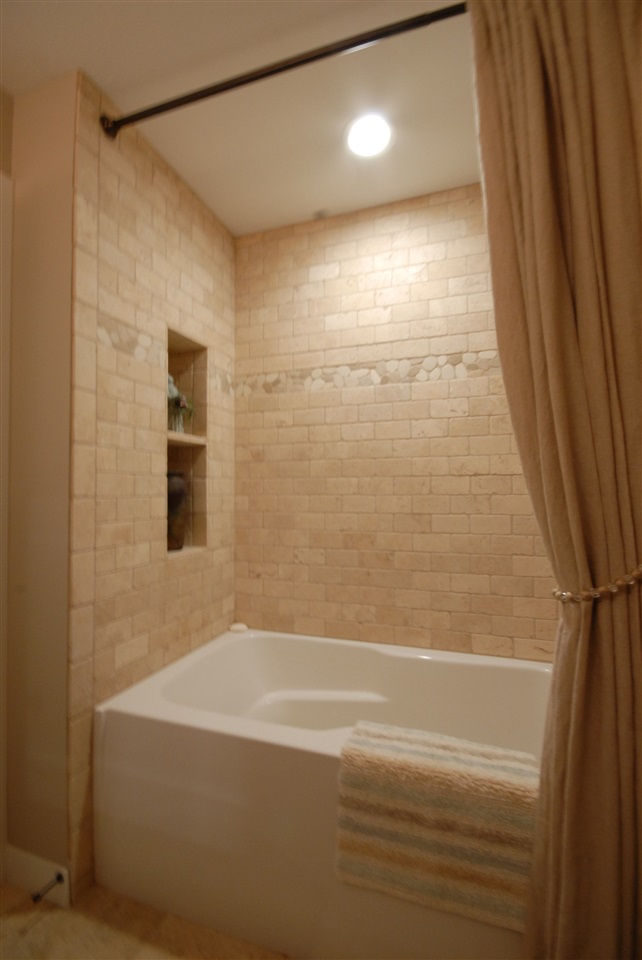 5525 Rural Edge Drive Roscoe, IL 61073 - Photo 16 of 21 a bathroom with a shower and a bath tub