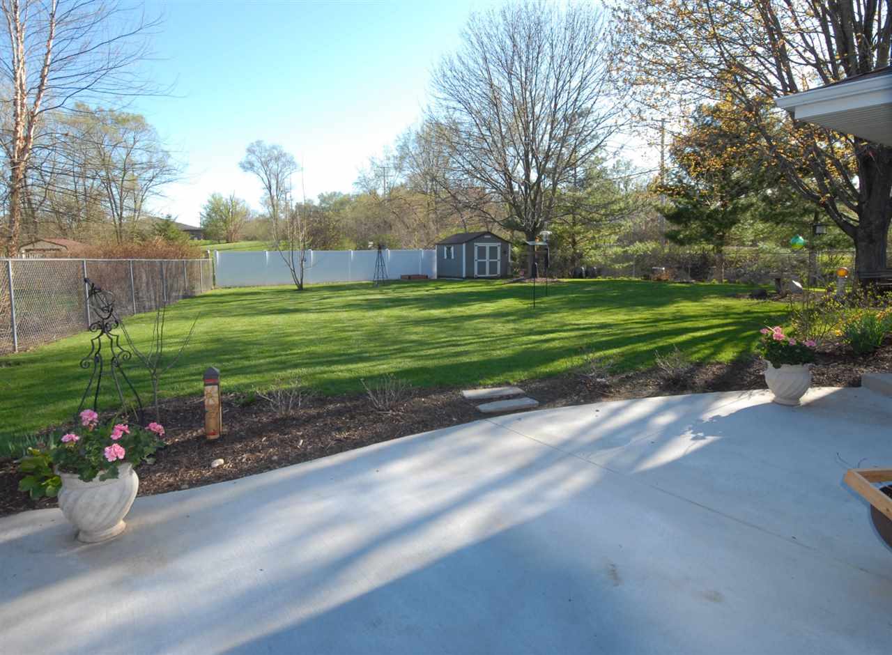 5525 Rural Edge Drive Roscoe, IL 61073 - Photo 4 of 21 a view of a park with large trees
