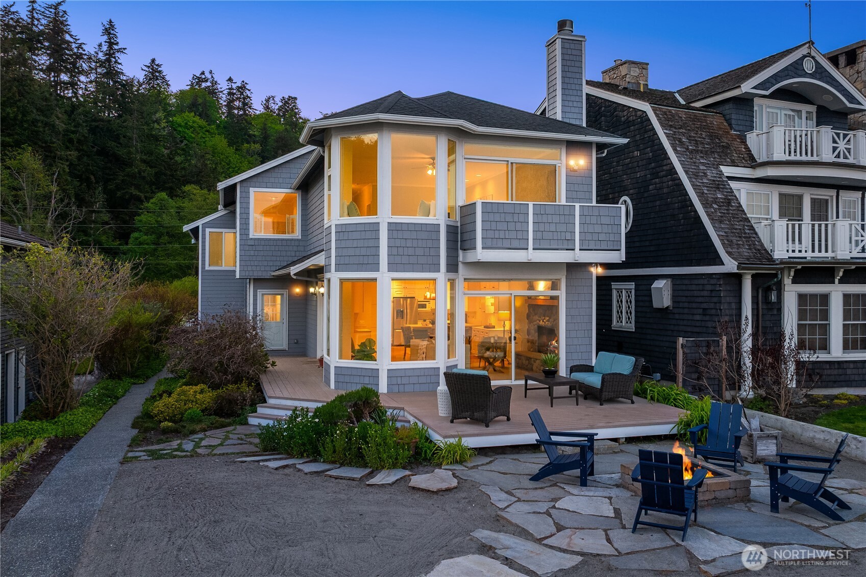 1882 Shore Avenue Freeland, WA 98249 - Photo 1 of 36 a front view of a house with garden
