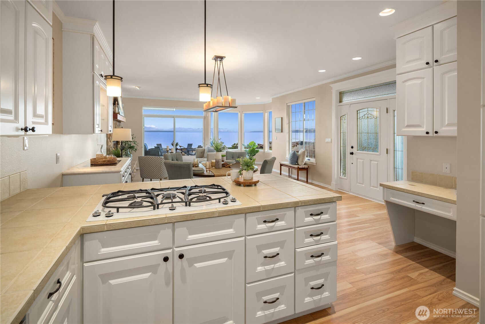 1882 Shore Avenue Freeland, WA 98249 - Photo 13 of 36 a kitchen with kitchen island a counter space and a refrigerator