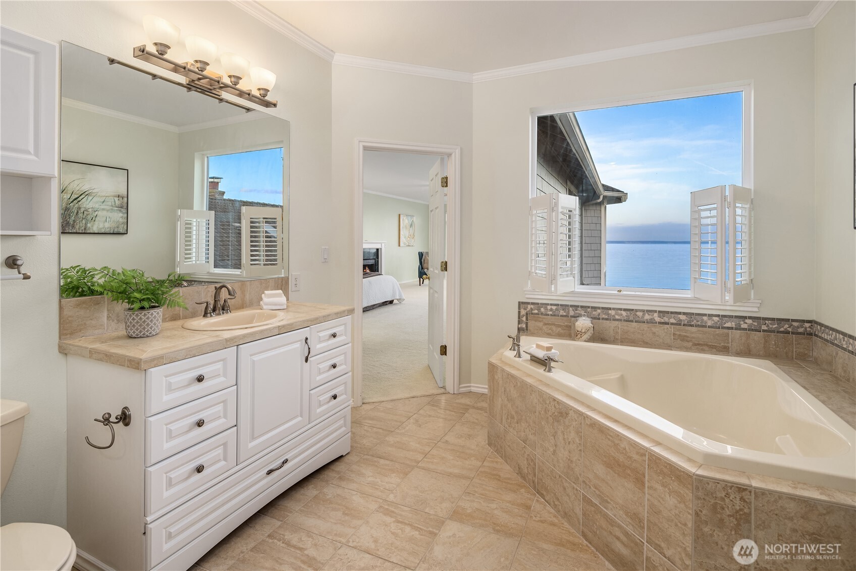 1882 Shore Avenue Freeland, WA 98249 - Photo 17 of 36 a spacious bathroom with a granite countertop tub double and mirror