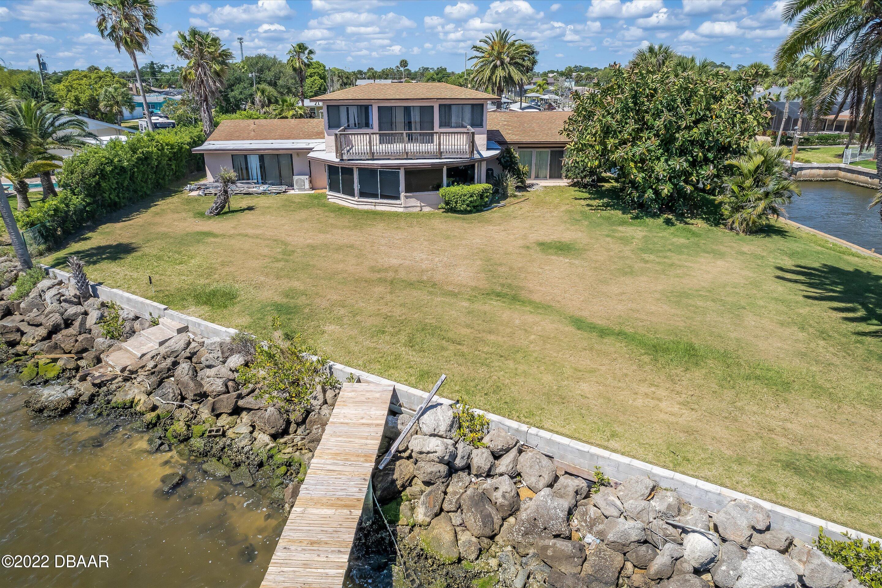 132 Reef Road South Daytona, FL 32119 - Photo 5 of 11 a view of a house with roof deck