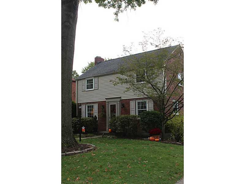 131 Orchard Spring Road Pittsburgh, PA 15220 - Photo 2 of 25 Exterior Front. Nicely landscaped yard with center concrete walkway to front entry shaded by mature trees