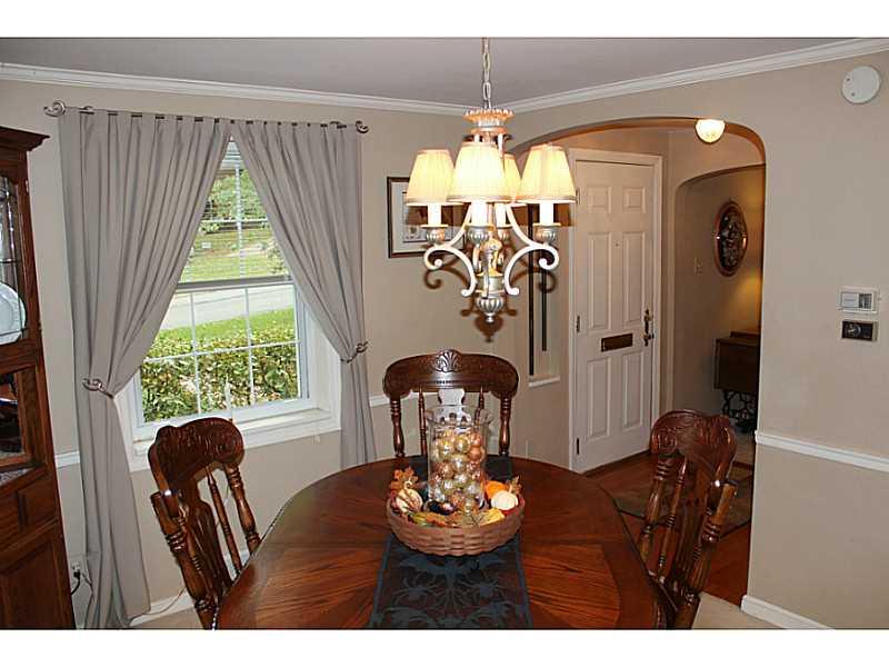 131 Orchard Spring Road Pittsburgh, PA 15220 - Photo 11 of 25 Dining Room. The dining room also has neutral carpeting and a beautiful chandelier.