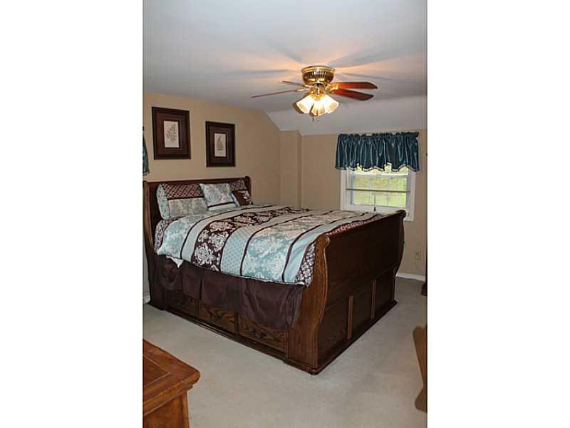 131 Orchard Spring Road Pittsburgh, PA 15220 - Photo 12 of 25 Master Bedroom. Spacious master bedroom with neutral carpeting and ceiling fan.