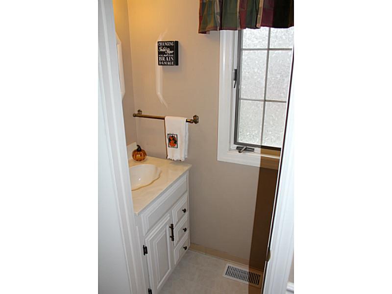 131 Orchard Spring Road Pittsburgh, PA 15220 - Photo 7 of 25 Partial Bath. Powder room located off of the family room