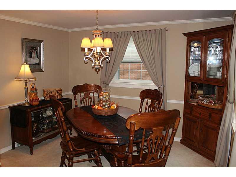 131 Orchard Spring Road Pittsburgh, PA 15220 - Photo 10 of 25 Dining Room. Great room to entertain guests for dinner complete with crown molding and chair rail.