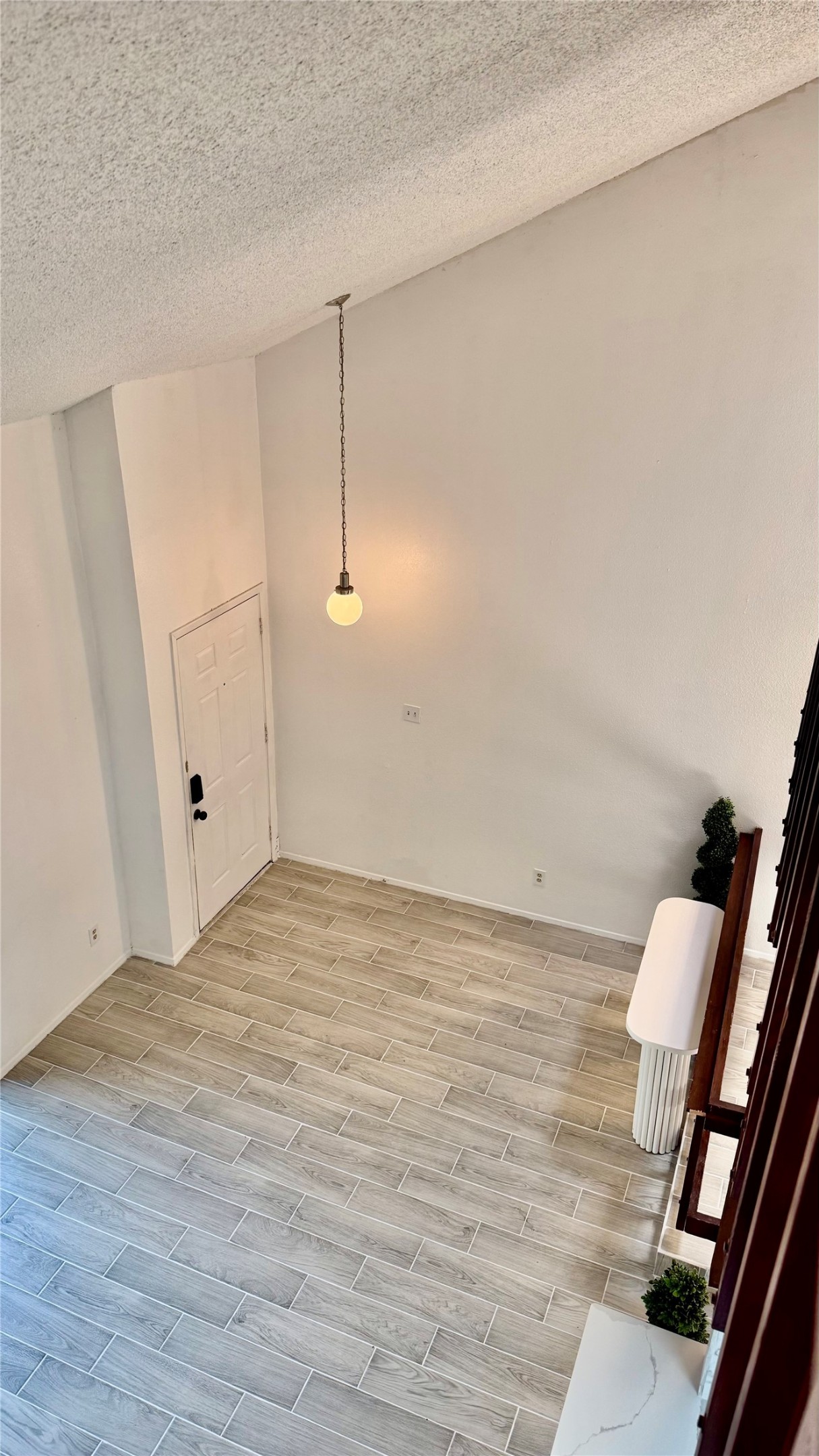 12922 Wirevine Lane Houston, TX 77072 - Photo 20 of 26 a view of an empty room and wooden floor