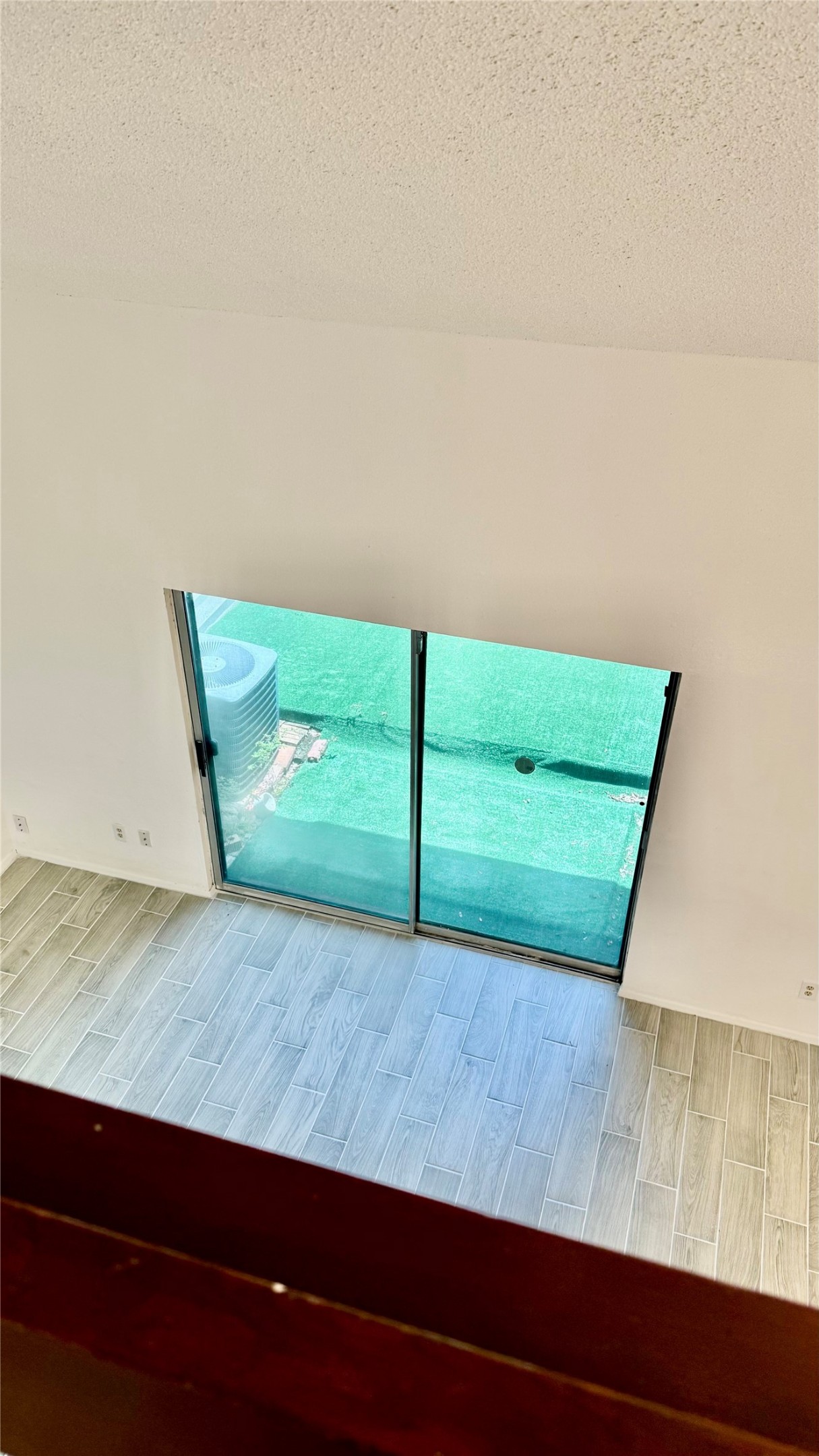 12922 Wirevine Lane Houston, TX 77072 - Photo 23 of 26 a view of a room with wooden floor