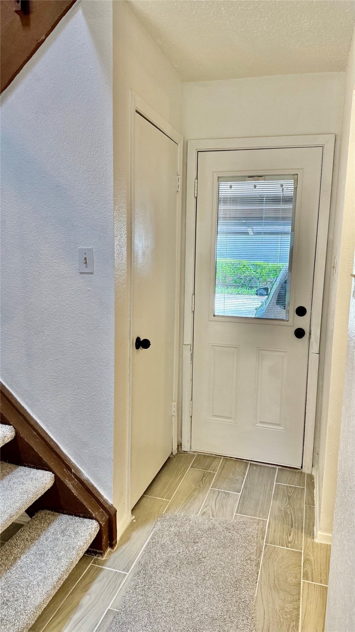 12922 Wirevine Lane Houston, TX 77072 - Photo 24 of 26 a view of a small space with wooden floor and a window