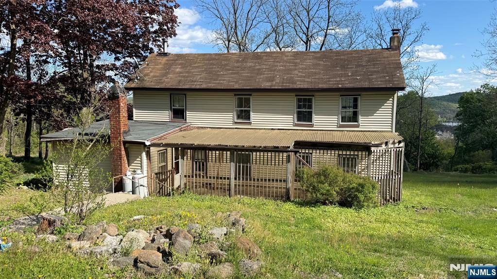 25 Coleman Hill Road Washington, NJ 07882 - Photo 1 of 18 front view of a house with a yard