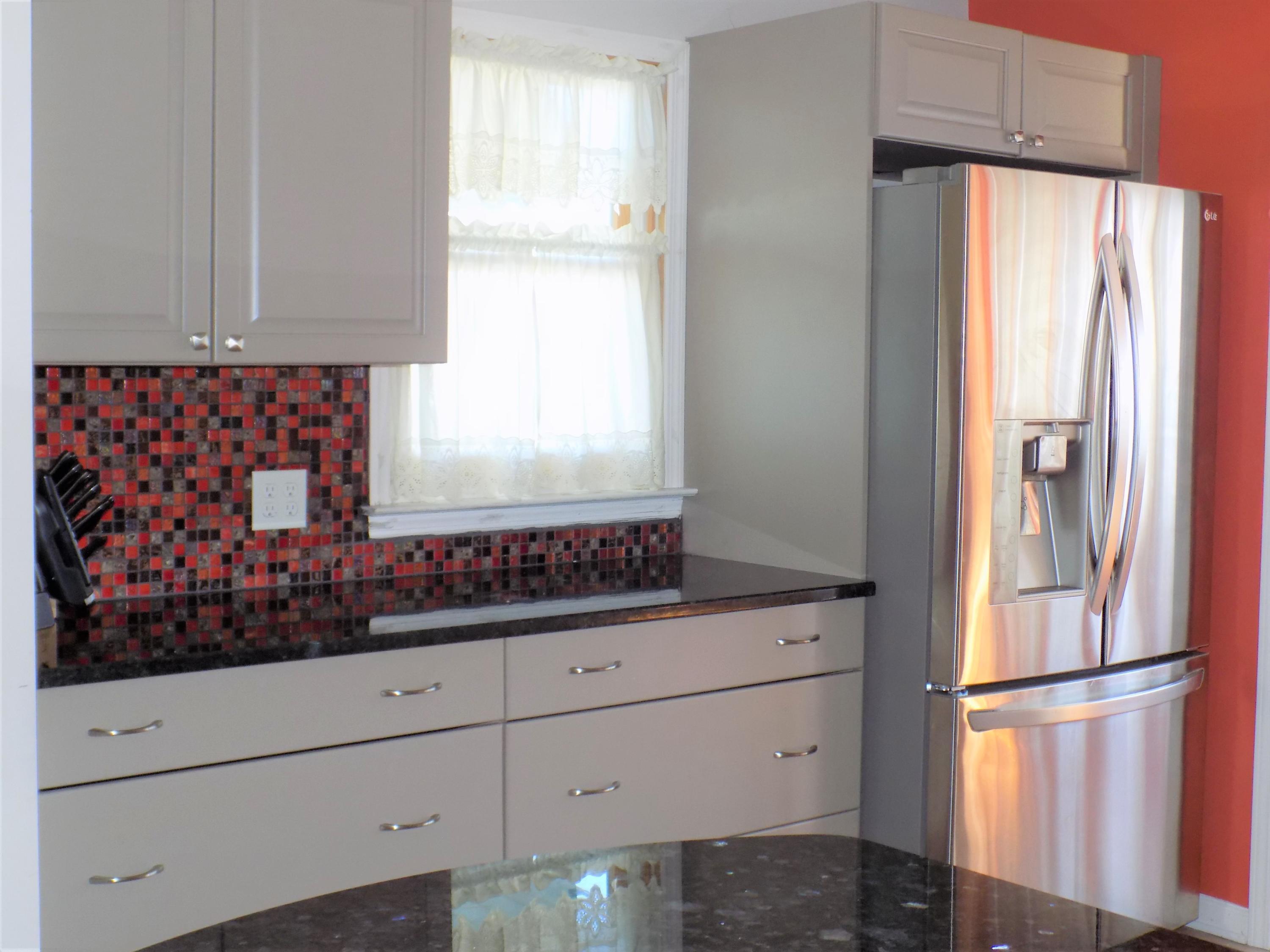 116 Gary Road Toms River, NJ 08753 - Photo 14 of 42 a kitchen with appliances cabinets and a window