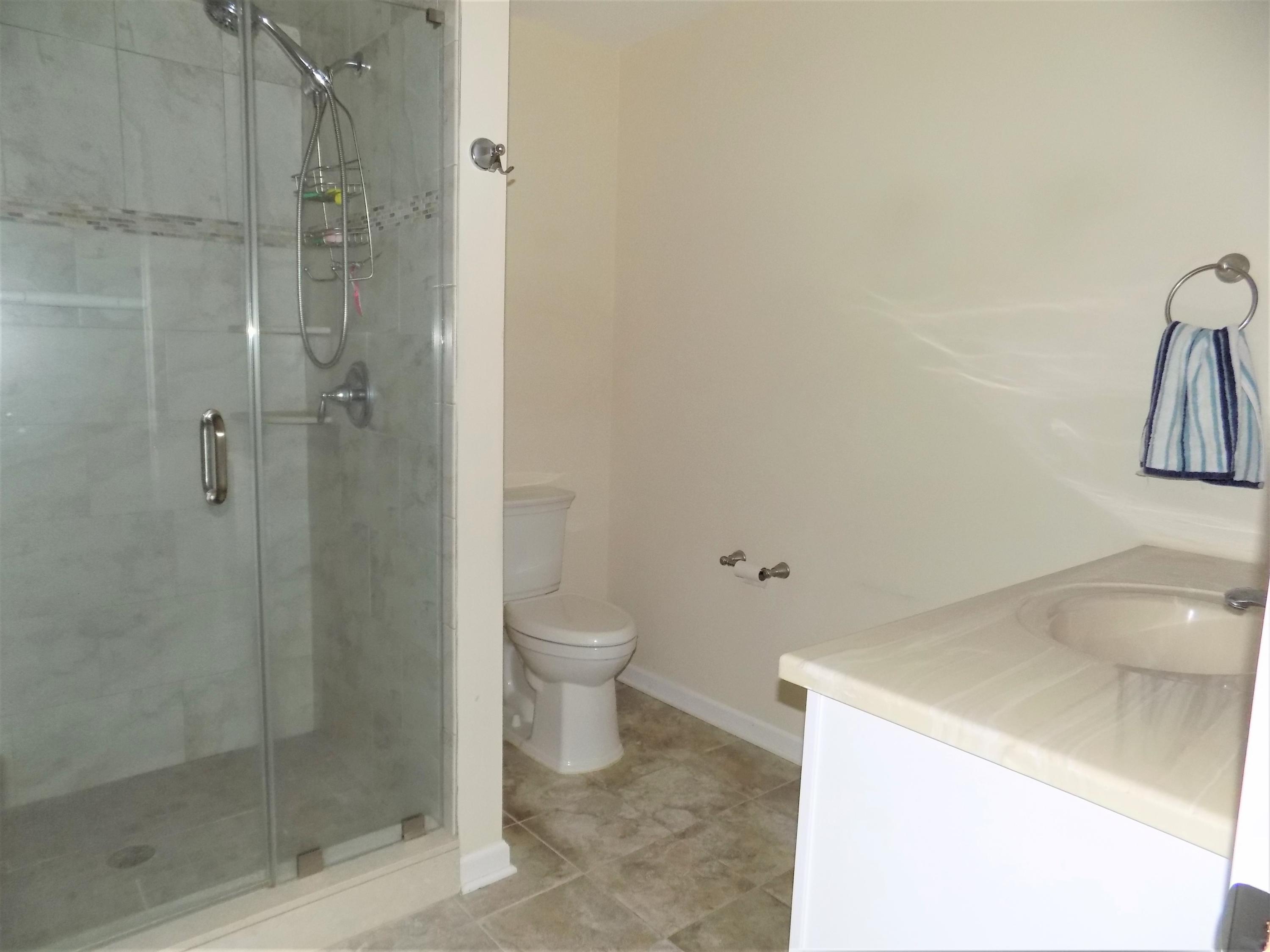 116 Gary Road Toms River, NJ 08753 - Photo 19 of 42 a bathroom with a sink a toilet and shower