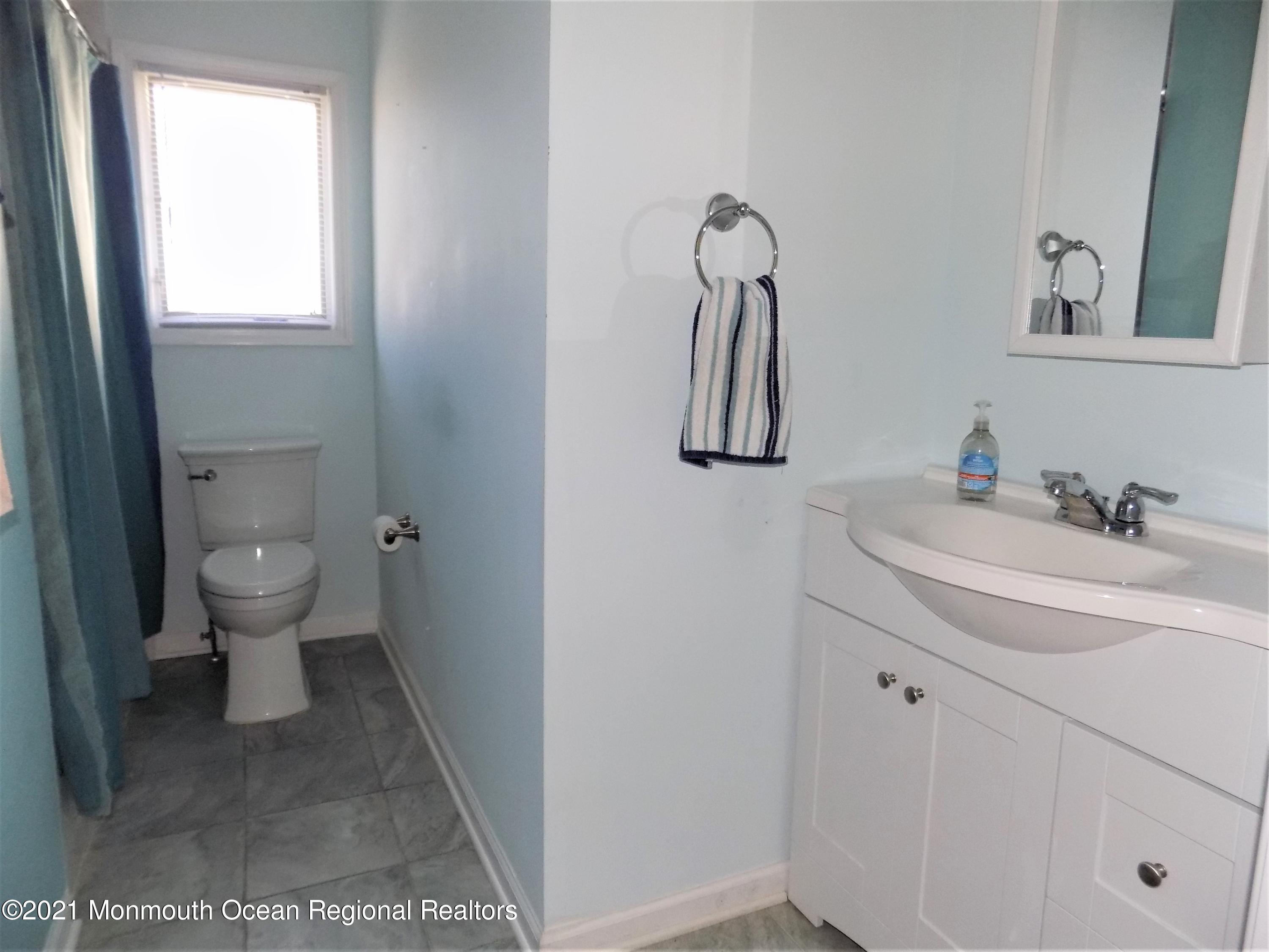 116 Gary Road Toms River, NJ 08753 - Photo 24 of 42 a bathroom with a sink and a toilet