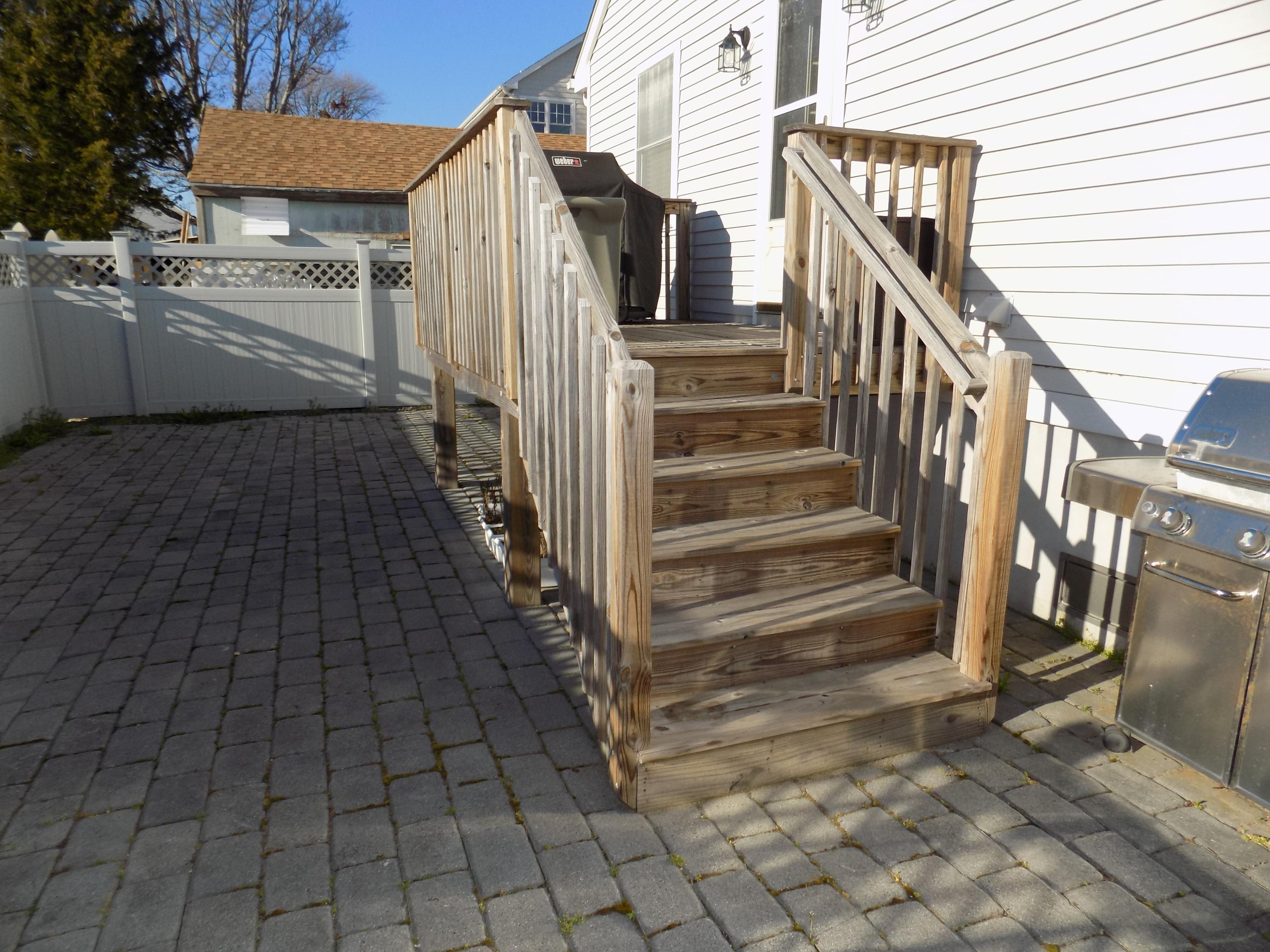 116 Gary Road Toms River, NJ 08753 - Photo 26 of 42 a view of a pathway of a house with wooden stairs