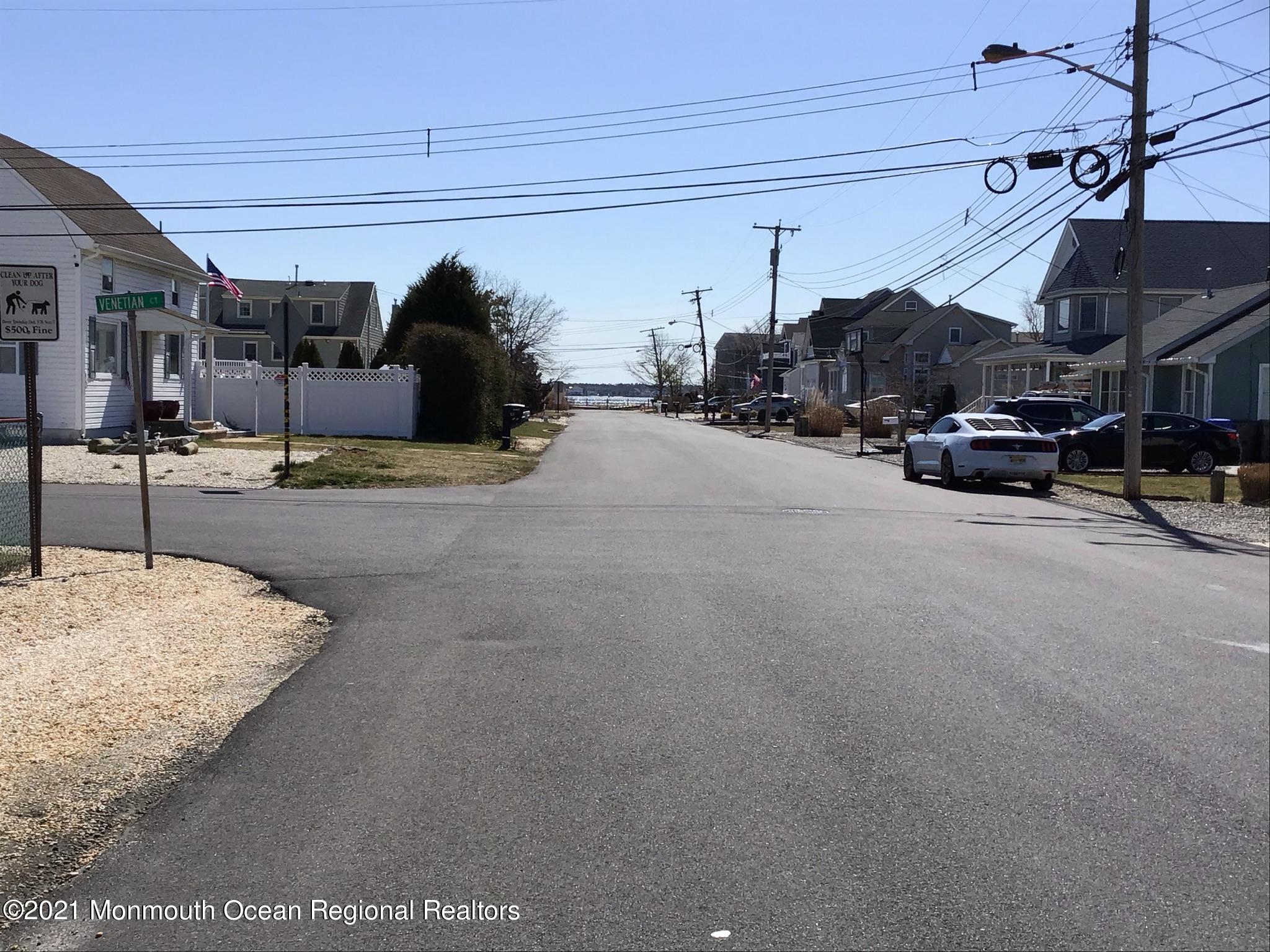116 Gary Road Toms River, NJ 08753 - Photo 40 of 42 a view of a city street with cars