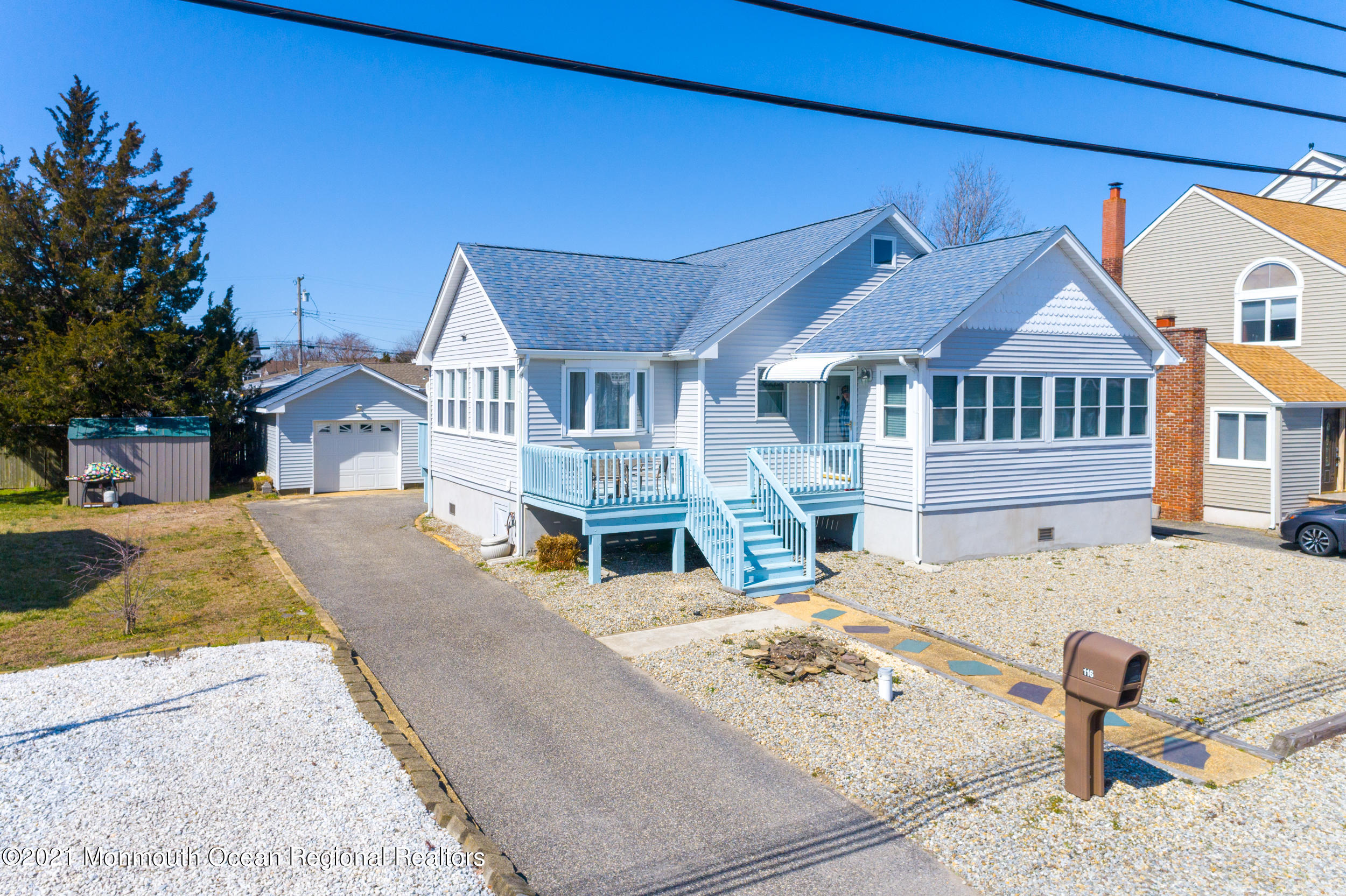 116 Gary Road Toms River, NJ 08753 - Photo 5 of 42 a front view of a house with a patio