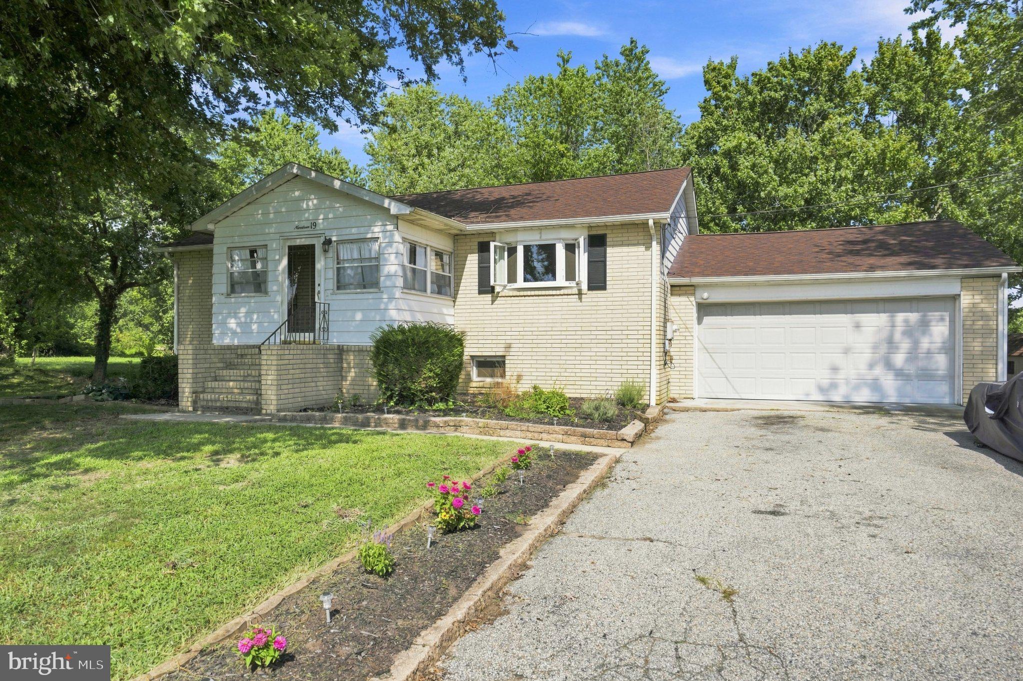 19 South Tilbury Road Salem, NJ 08079 - Photo 1 of 25 Charming home with lush greenery.