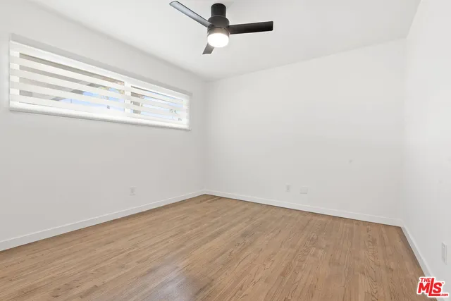 a view of a hallway with entryway door front door