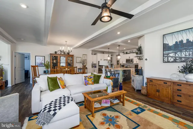 a living room with lots of furniture and rug