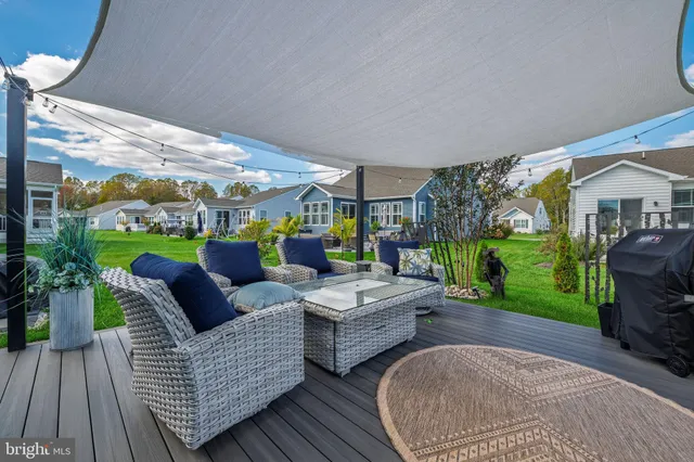 a outdoor living space with furniture and garden view
