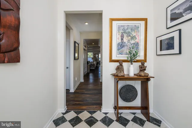 a view of a hallway with washer and dryer