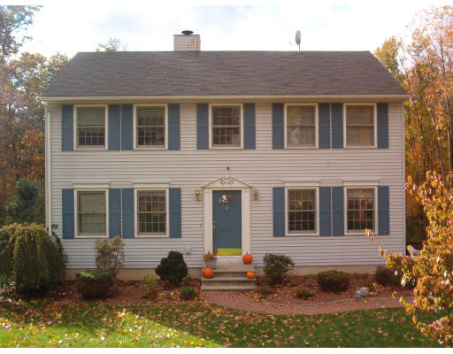 53 Clark Road Sturbridge, MA 01518 - Photo 1 of 5 a house view with a garden space