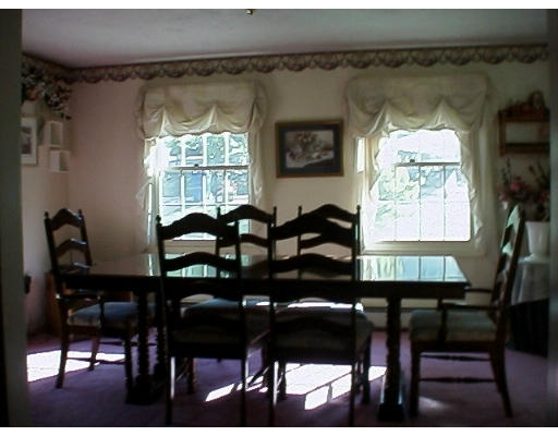 53 Clark Road Sturbridge, MA 01518 - Photo 3 of 5 a view of a dining room with furniture and window