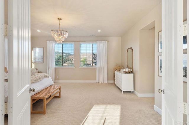a room with furniture and a chandelier