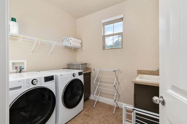 a view of a wooden door with a yard
