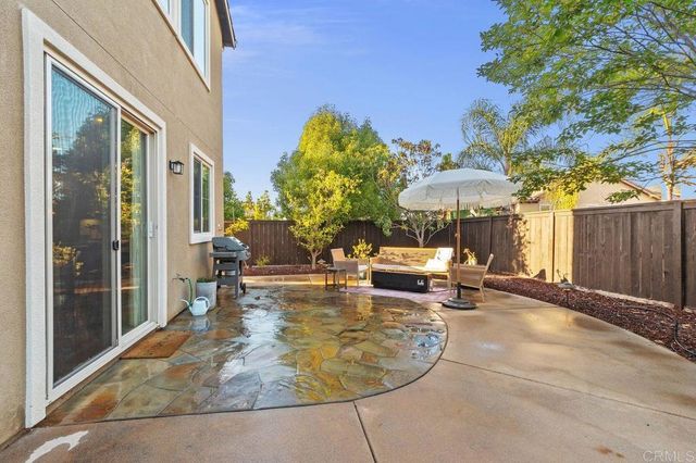 an aerial view of ocean and residential houses