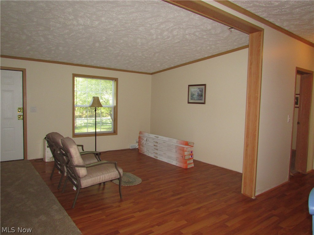 1220 Way Road Rome, OH 44085 - Photo 9 of 25 Another view of the living room.