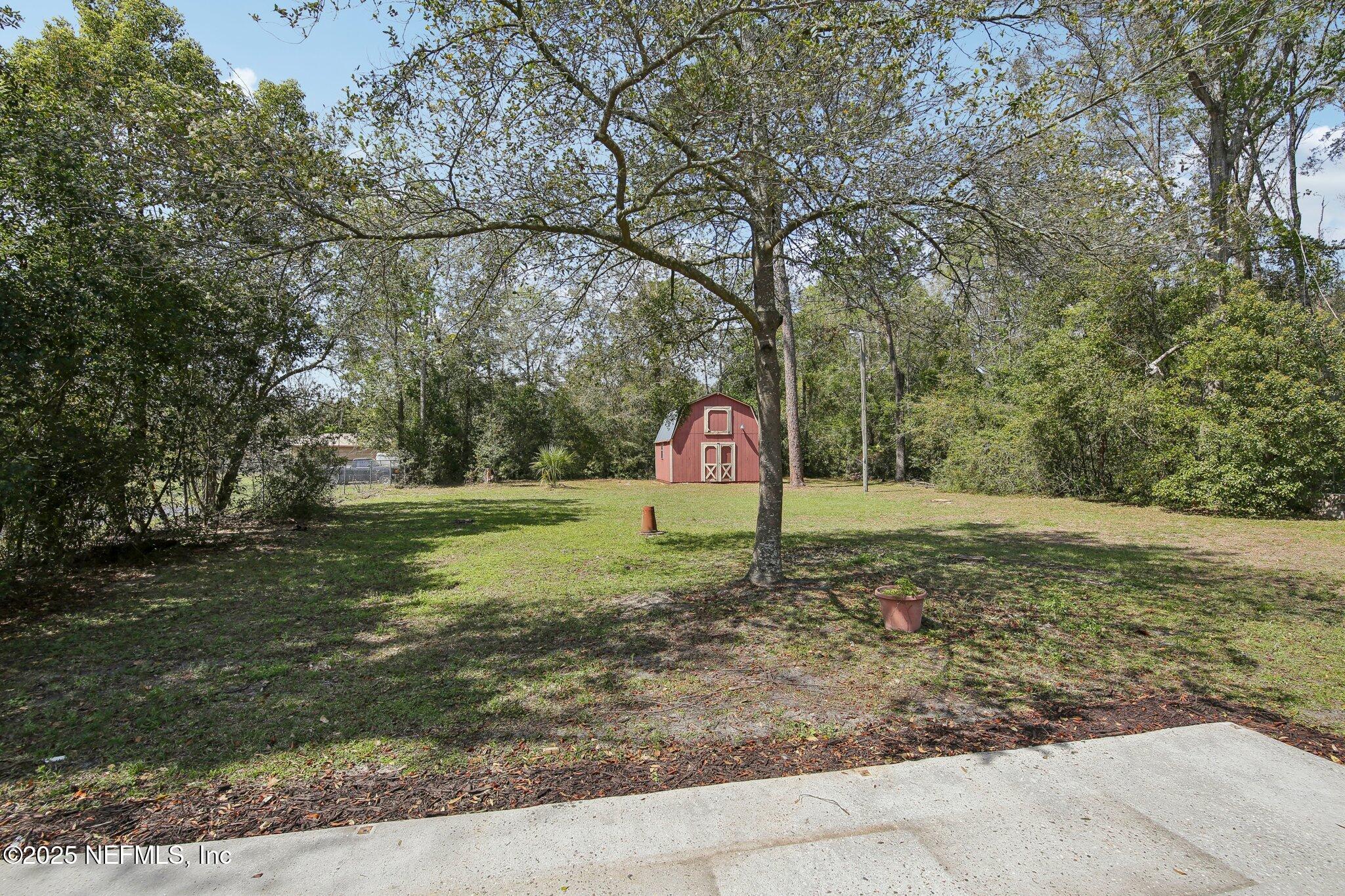 8138 Westport Road Jacksonville, FL 32244 - Photo 27 of 45 a view of a park with large trees