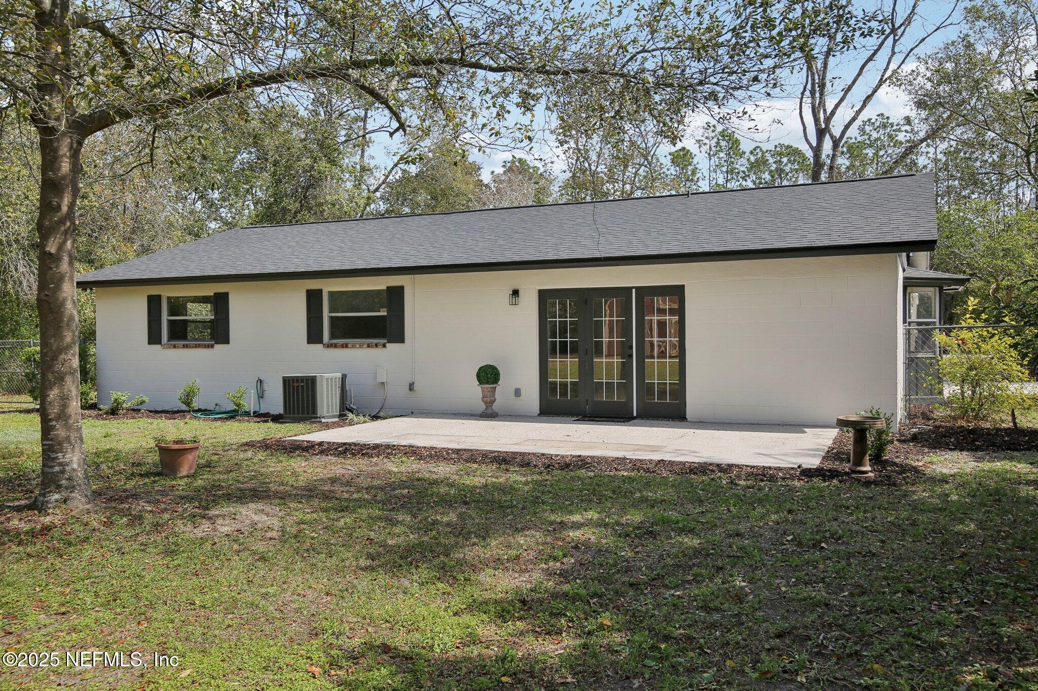 8138 Westport Road Jacksonville, FL 32244 - Photo 32 of 45 a house that has a tree in front of it