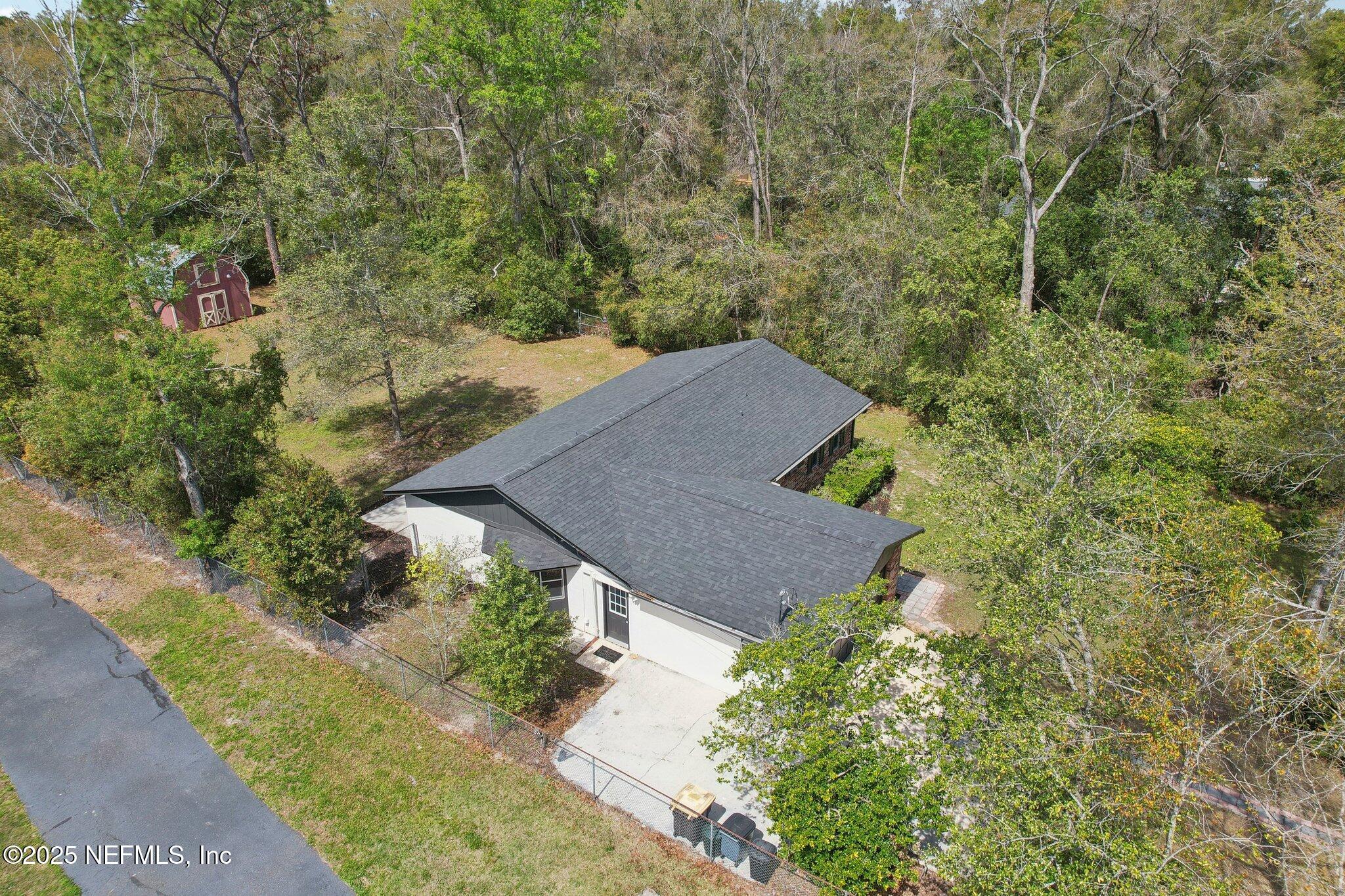 8138 Westport Road Jacksonville, FL 32244 - Photo 37 of 45 a view of a house with a yard