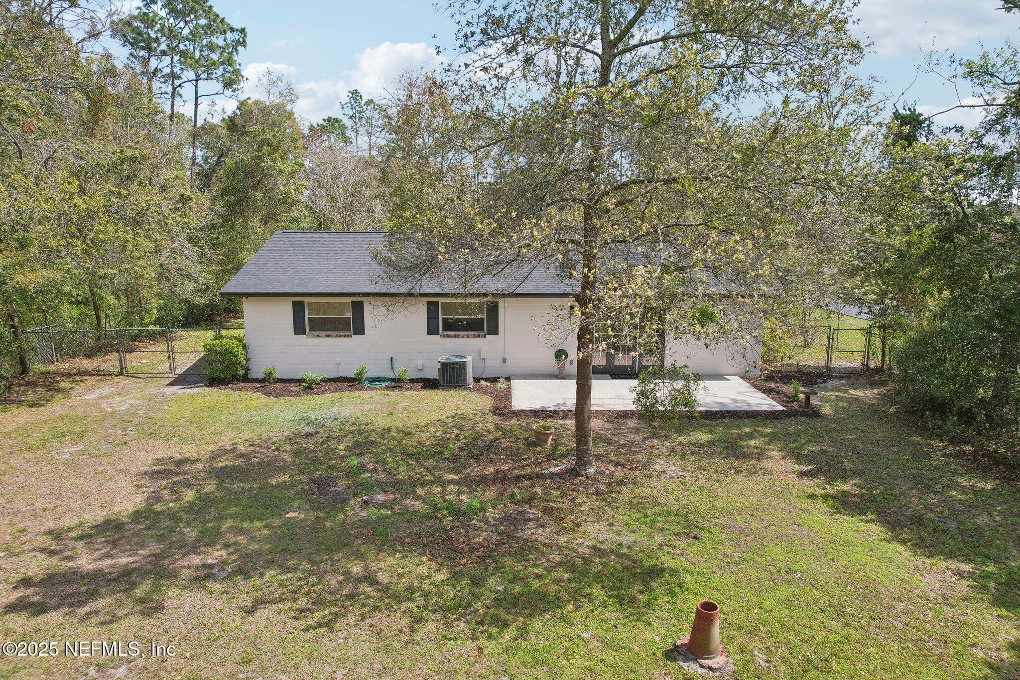8138 Westport Road Jacksonville, FL 32244 - Photo 39 of 45 a house view with a swimming pool