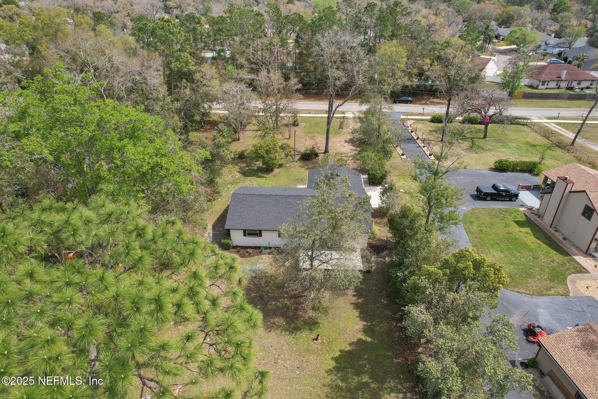 8138 Westport Road Jacksonville, FL 32244 - Photo 41 of 45 an aerial view of residential house with outdoor space
