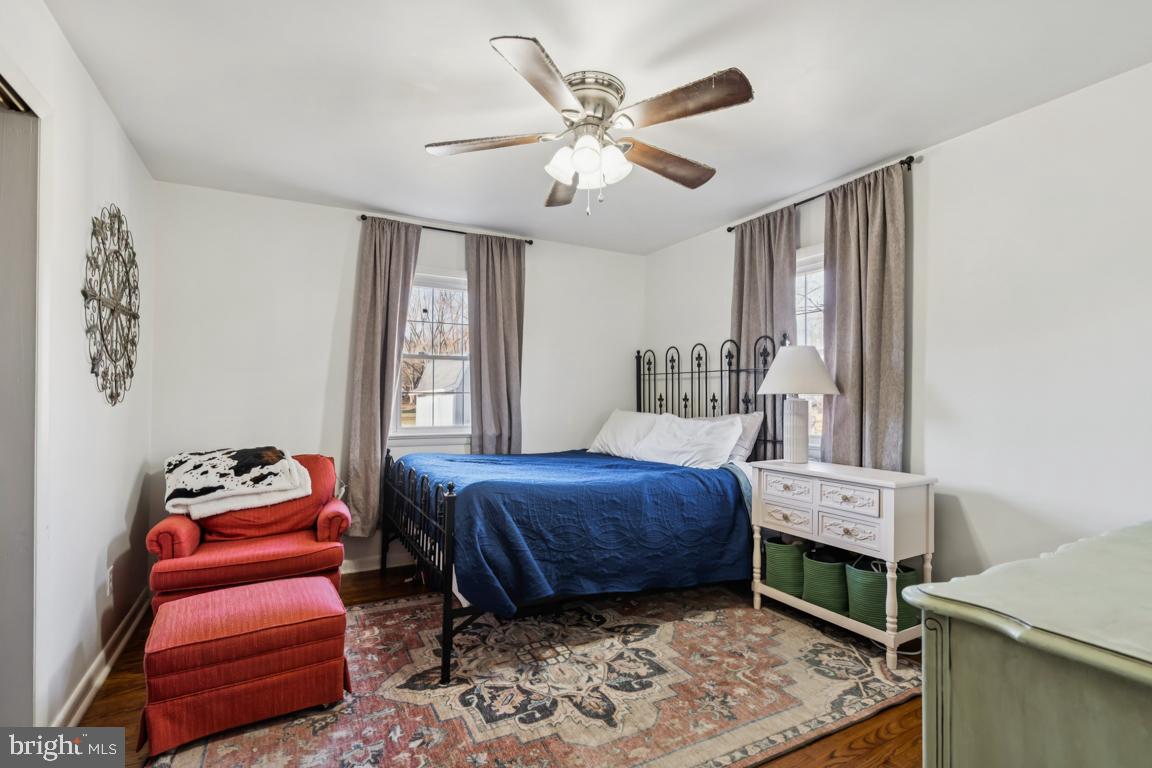 81 Harvard Road Pennsville, NJ 08070 - Photo 18 of 32 a bedroom with a bed dresser and a window