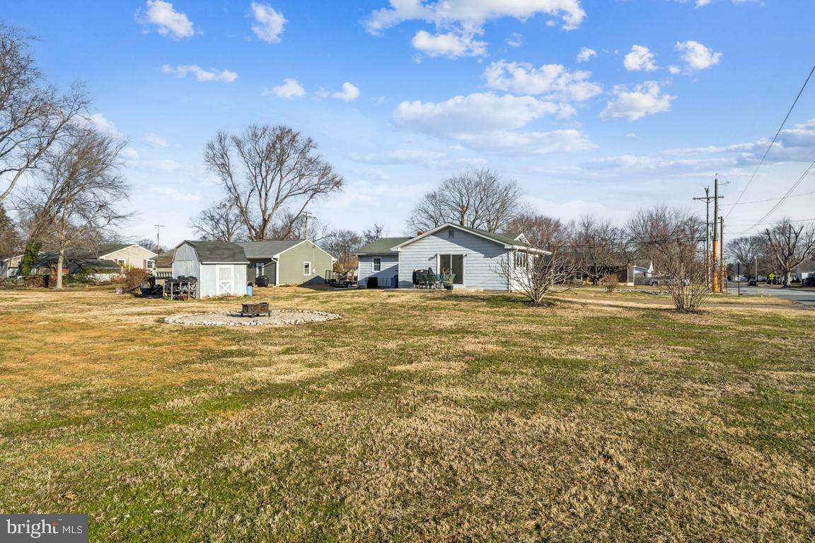 81 Harvard Road Pennsville, NJ 08070 - Photo 24 of 32 a view of yard with swimming pool and green space