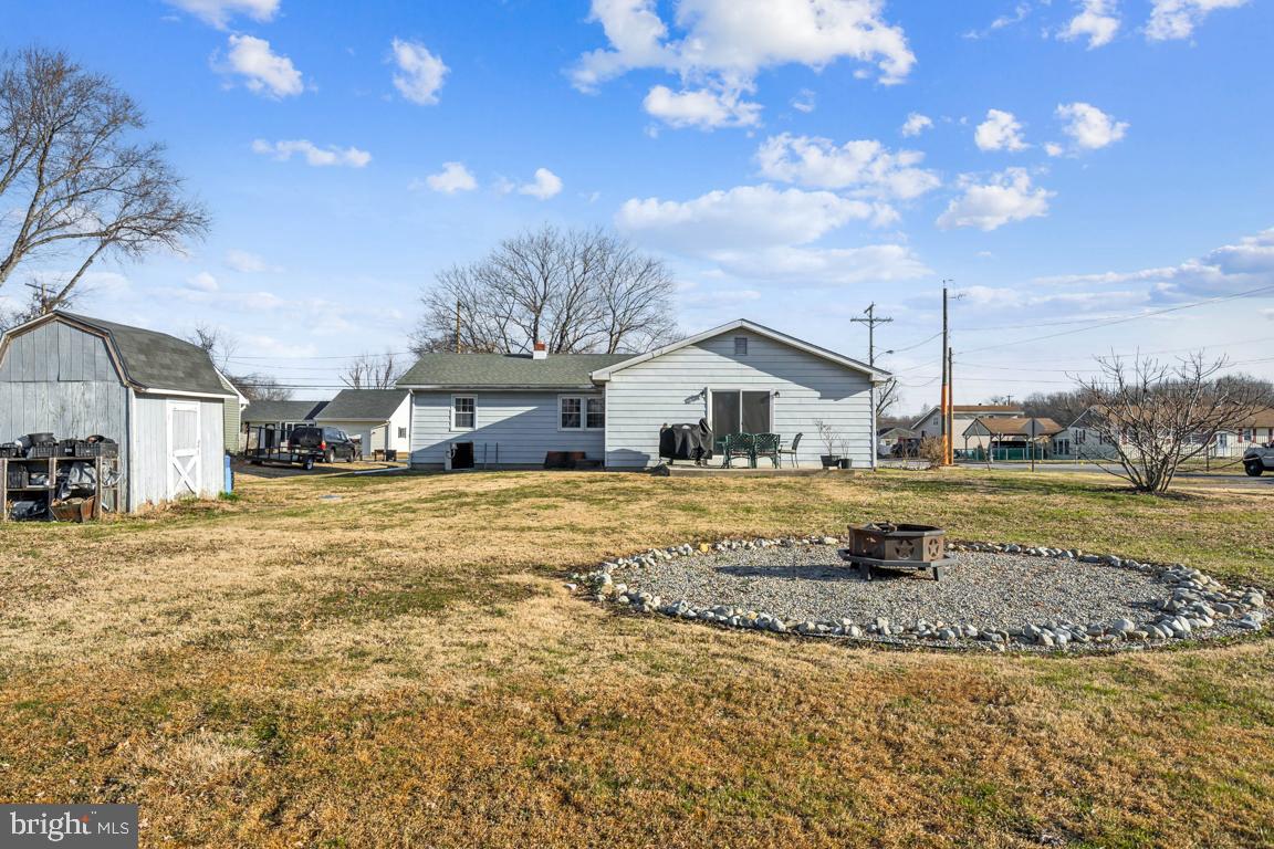 81 Harvard Road Pennsville, NJ 08070 - Photo 25 of 32 a house view with a swimming pool