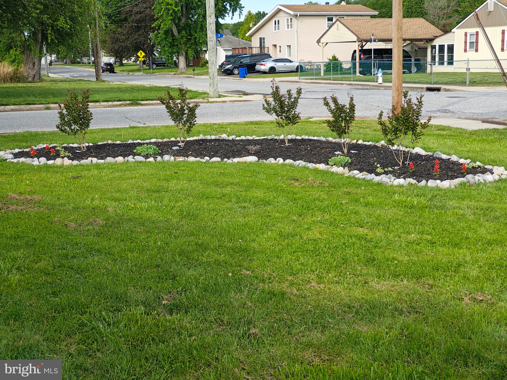 81 Harvard Road Pennsville, NJ 08070 - Photo 26 of 32 a front view of a house with a yard