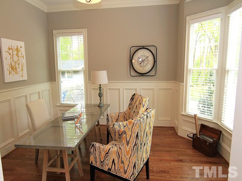 3341 Hampton Road Raleigh, NC 27607 - Photo 3 of 25 a view of a dining room with furniture window and wooden floor