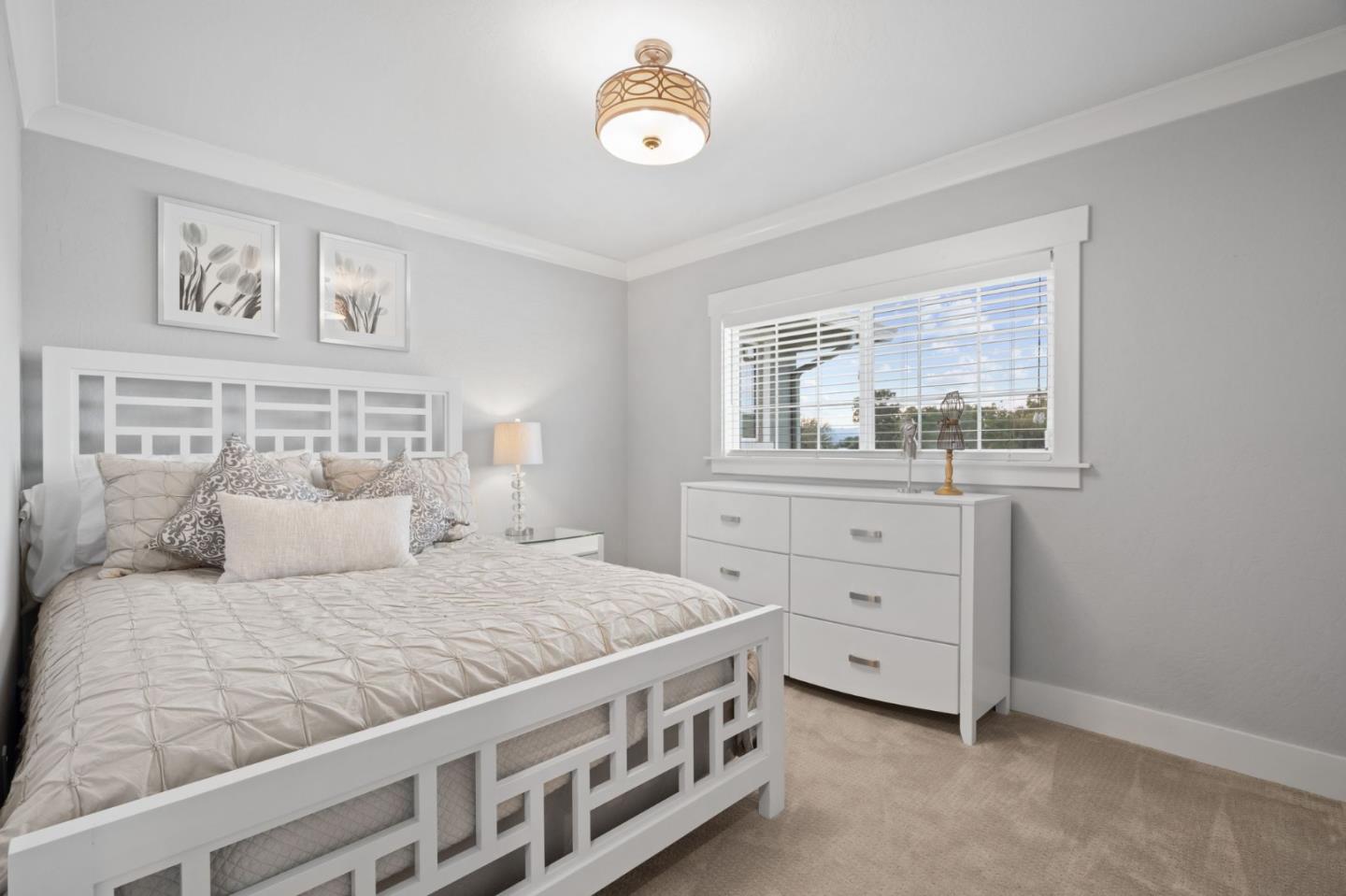 2985 Roop Road Gilroy, CA 95020 - Photo 12 of 41 a bedroom with a bed and a window