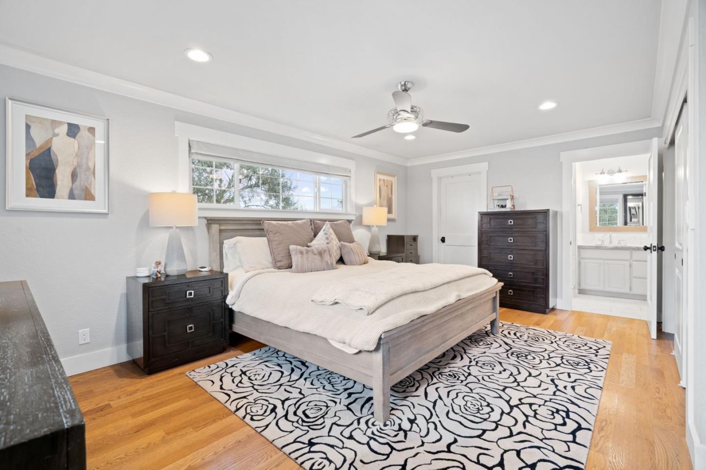 2985 Roop Road Gilroy, CA 95020 - Photo 13 of 41 a bedroom with a large bed and a window