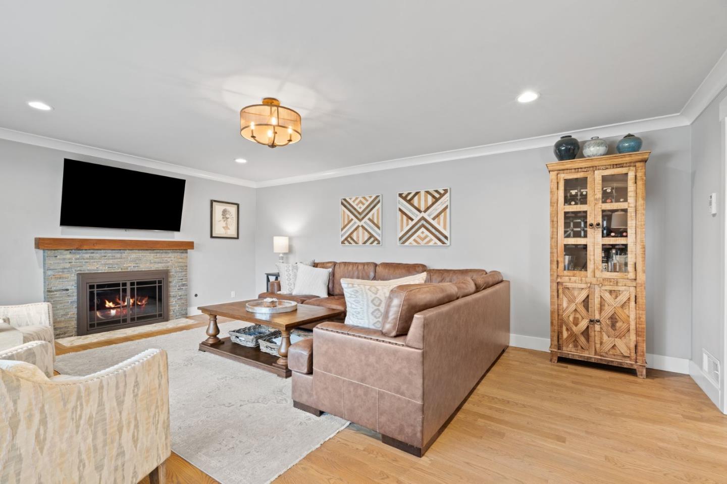 2985 Roop Road Gilroy, CA 95020 - Photo 9 of 41 a living room with furniture and a fireplace