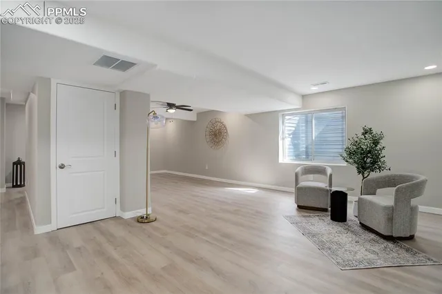 a view of livingroom with furniture and window