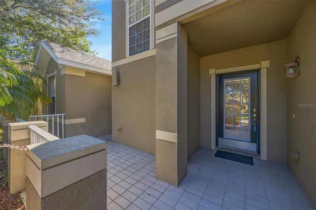 a view of a livingroom with furniture and front door