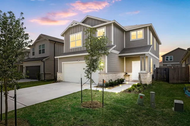 a house view with a garden space